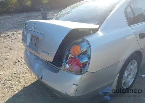 2002 Nissan Altima 2.5 S z USA, uszkodzony, nr VIN 1N4AL11DX2C252283